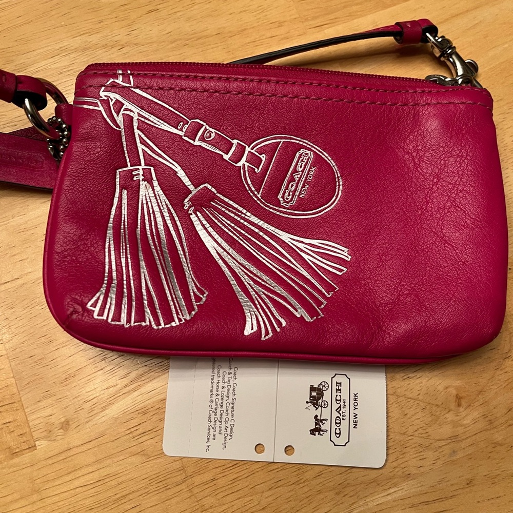 Coach wristlet wallet Fuchsia Leather Wristlet w/silver embossedTassel Design